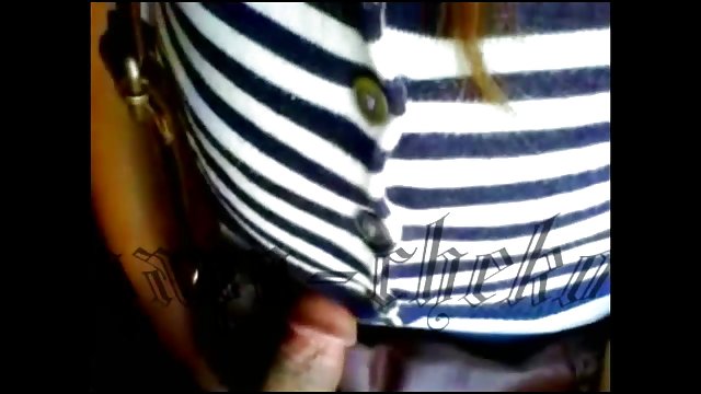 Young amateur in mesh stockings pushes a pair of fingers into her vagina