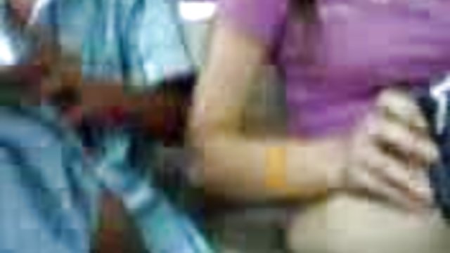 Two lesbians actively rub their pussies